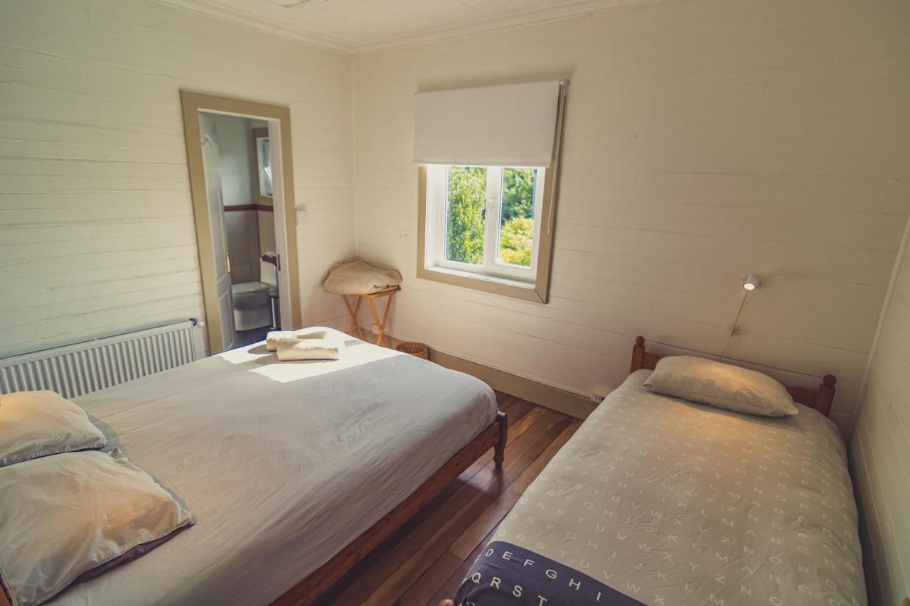 Hostal Compass Del Sur Puerto Varas Quarto foto
