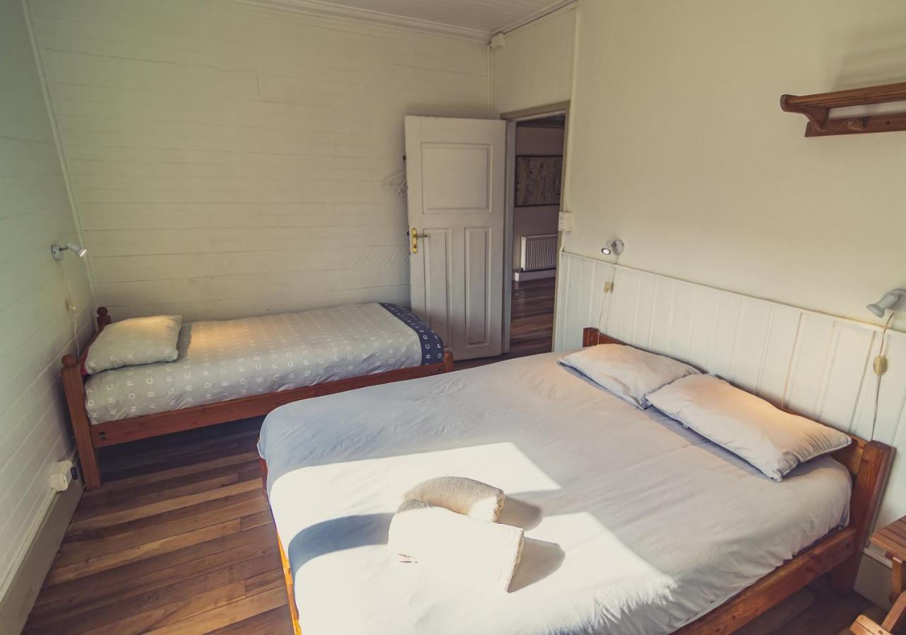 Hostal Compass Del Sur Puerto Varas Quarto foto